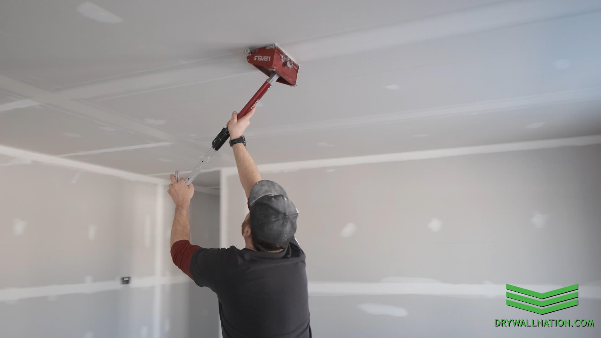 Drywall contractor working on interior wall repair in Everett, Washington